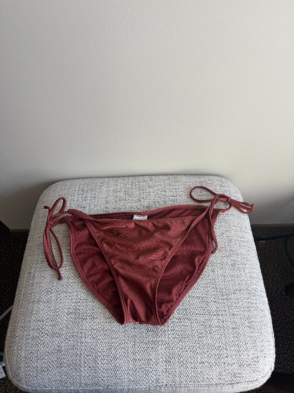 Red-brown bikini bottom with back scrunch and side ties.